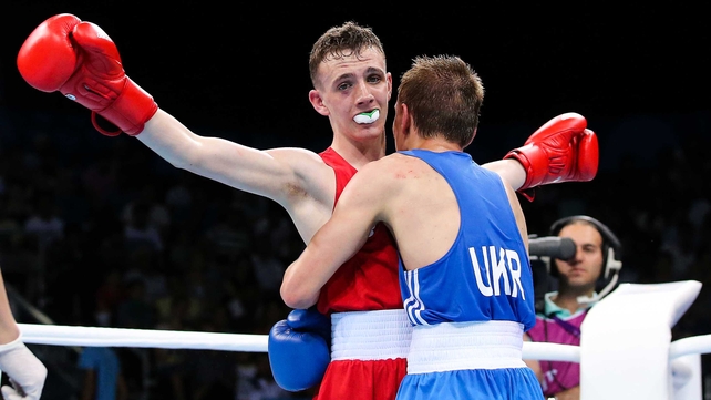 Ireland's Brendan Irvine (red) in action against Dmytro Zamotayev (nlue) of Ukraine on Wednesday at the European Games in Baku