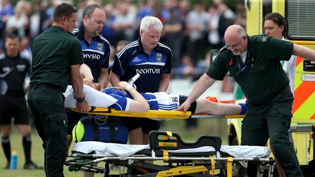 Cavan's Rory Dunne leaves the field with an injury during the qualifer against London on Saturday