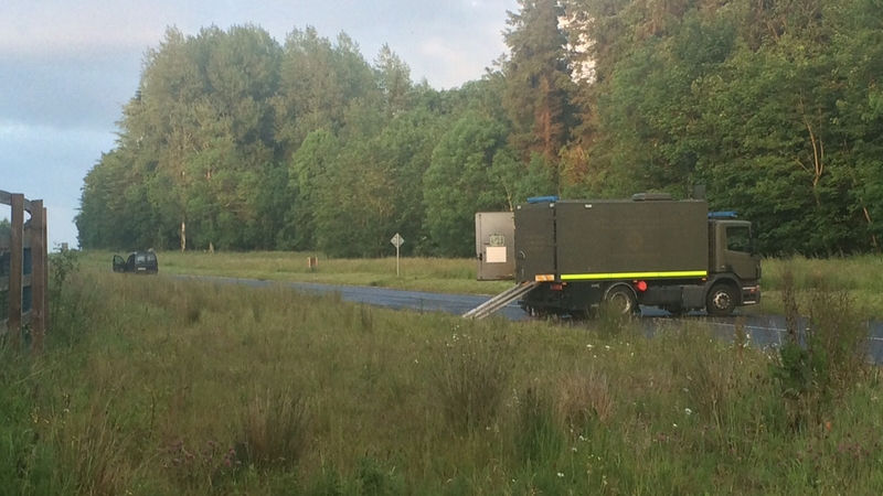 Gardaí arrested four men after what was described as suspicious activity and the discovery of a suspect explosive device