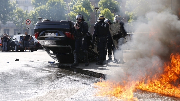 Police in riot gear at one point intervened using tear gas