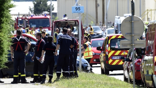 Police sources said the decapitated body was found at the site, along with a flag bearing Islamist inscriptions