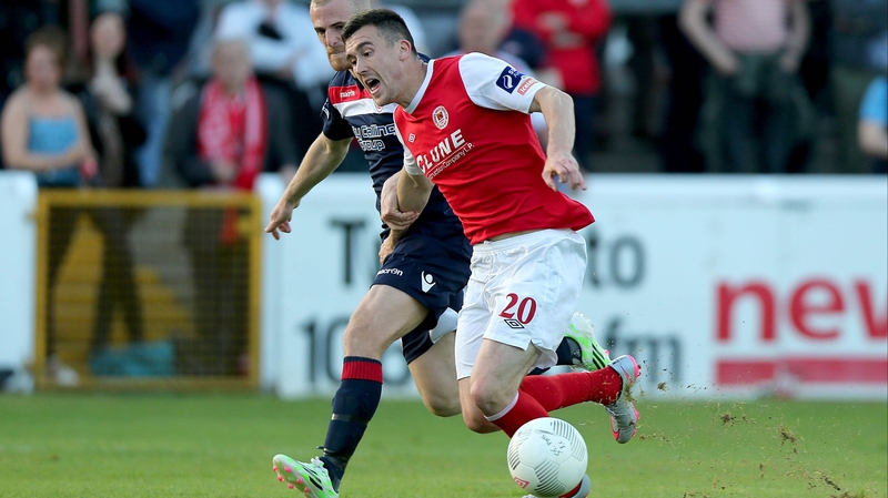 Aaron Green of St Pat's is brought down for a penalty