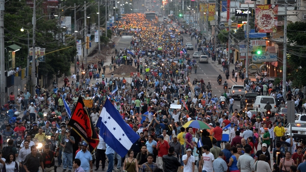 Protesters are demanding the resignation of President Hernandez