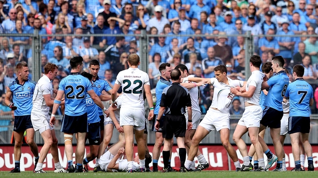 Dublin and Kildare players dance around their handbags in the Leinster SFC semi-final at Croke Park