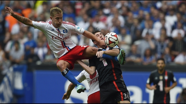 Lewis Holtby (L) moved to Hamburg last September on loan
