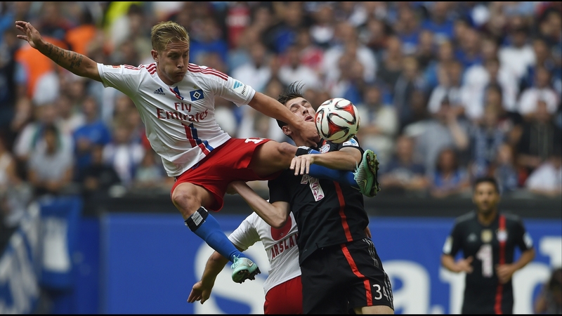 Lewis Holtby (L) moved to Hamburg last September on loan