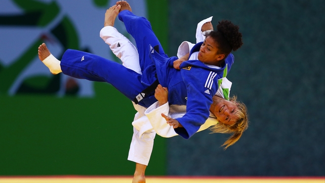 Laetitia Blot of France and Miryam Roper (blue) of Germany compete in the Judo Women's Team gold medal match at Baku