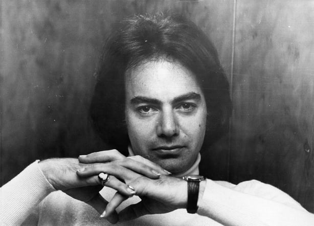 A black and white photo of Neil Diamond