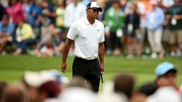 The 14-time major champion made four birdies on the rain-softened course