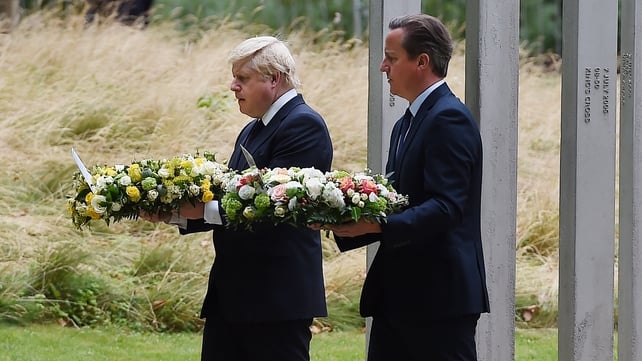 British Prime Minister David Cameron and London Mayor Boris Johnson lay a wreath at the 7/7 Memorial
