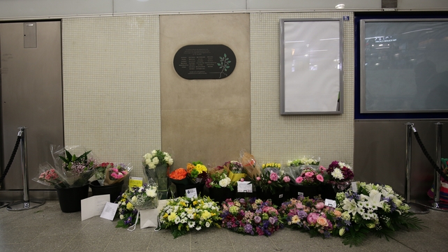 Floral tributes left at Kings Cross Underground station in London