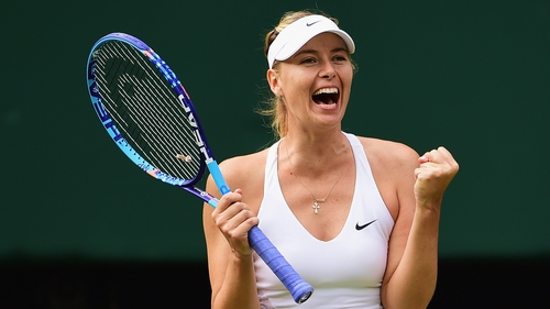 Maria Sharapova react after beating Coco Vandeweghe to reach the Wimbledon semi-final