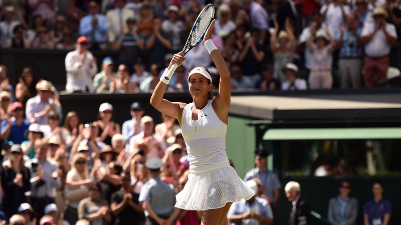 Garbine Muguruza celebrates beating Poland's Agnieszka Radwanska in their semi-final