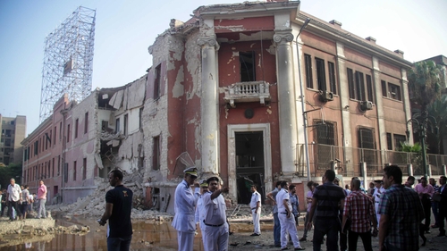 The explosion was likely caused by a bomb planted in a car parked near the consulate