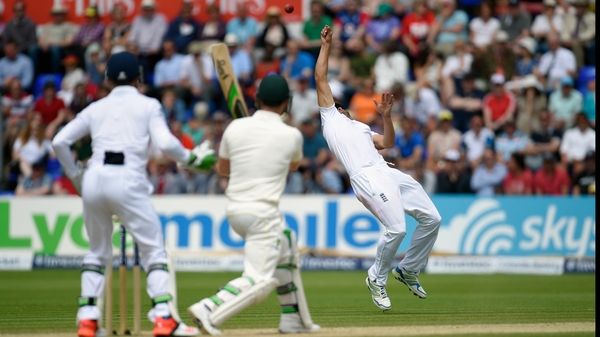 Alastair Cook parries a shot from Australia batsman Brad Haddin