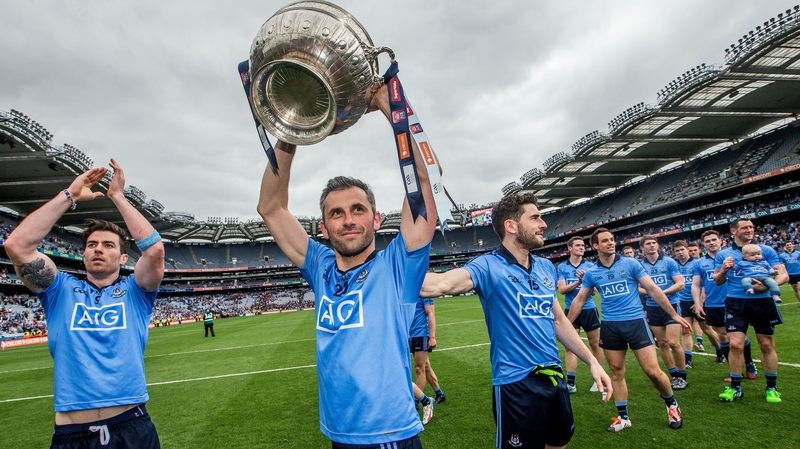 Alan Brogan parades the cup in front of Hill 16
