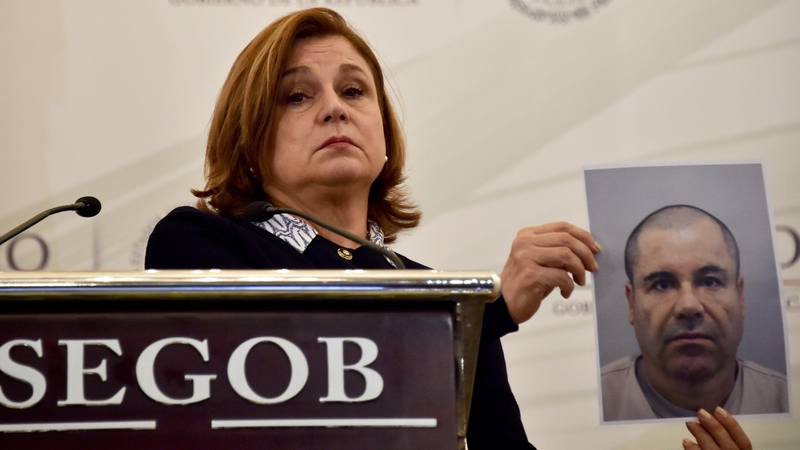 Attorney General Arely Gomez shows a picture of Joaquin 'El Chapo' Guzman during a press conference