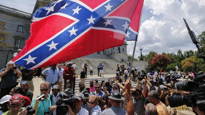 The protest follows the removal of the Confederate flag from the grounds of the state house last week