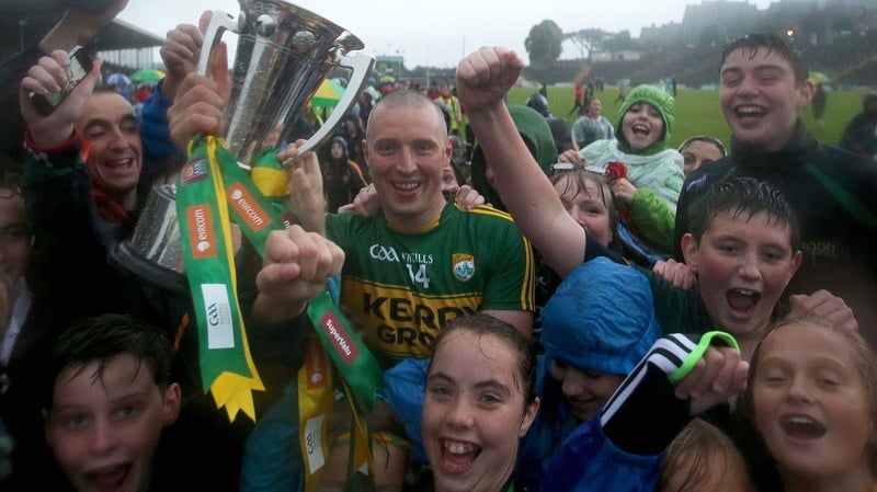 Kerry captain Kieran Donaghy celebrates with supporters at the end of the game