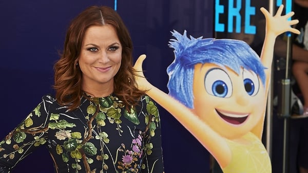 Poehler with Inside Out alter-ego Joy: "It's given me a new lens on how to look at the world and my feelings and my emotions"