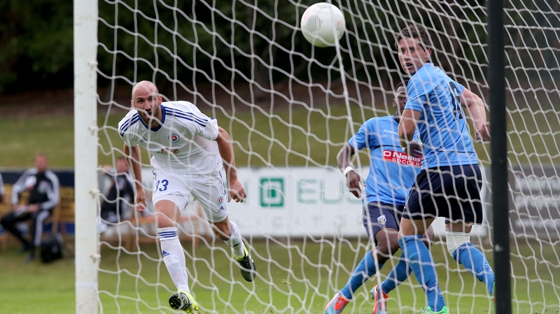 Slovan Bratislava's Robert Vittek scores the opening goal