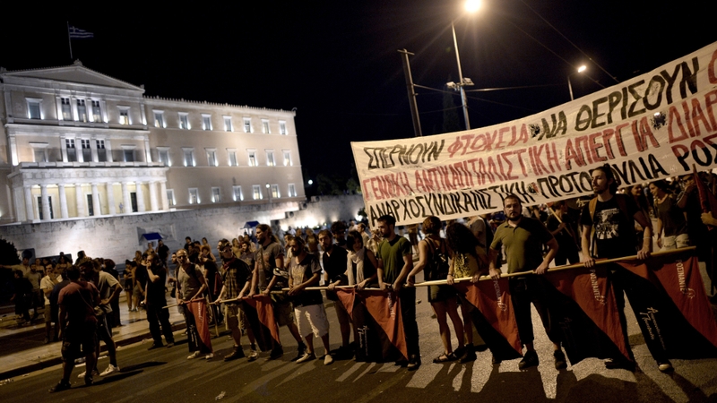 Officials say talks cannot begin until the right location is found, given the talks' sensitivity and the wide public anger about austerity policies