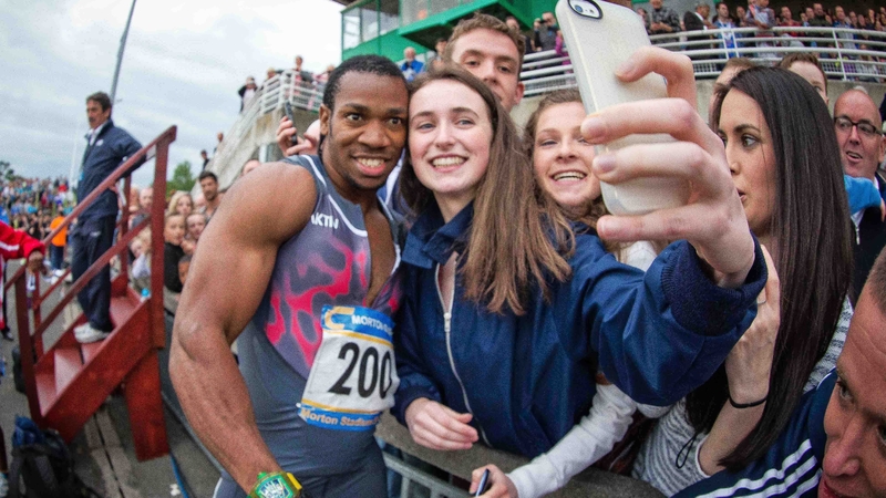 Yohan Blake poses for a selfie at Morton Stadium