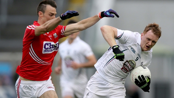 Kevin O'Driscoll of Cork with Paul Cribbin of Kildare