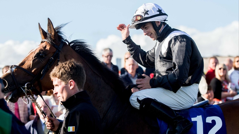 Wayne Lordan acknowleges the Galway crowd after leading Hint Of A Tint home in the Topaz Mile Handicap