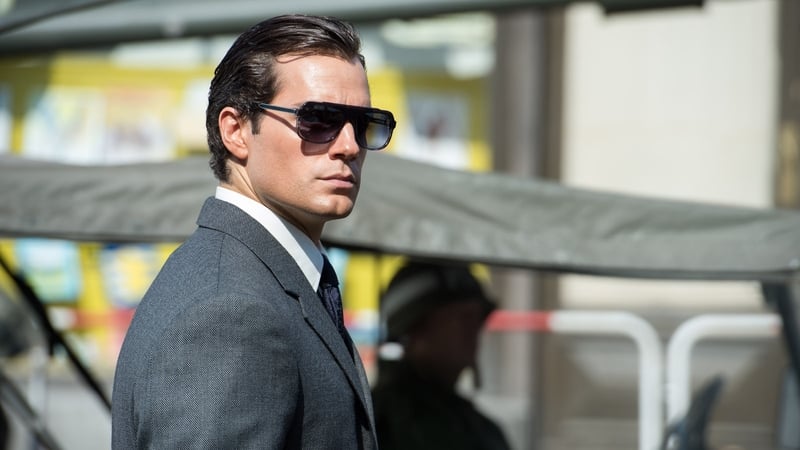 Henry Cavill stars as CIA agent Napoleon Solo