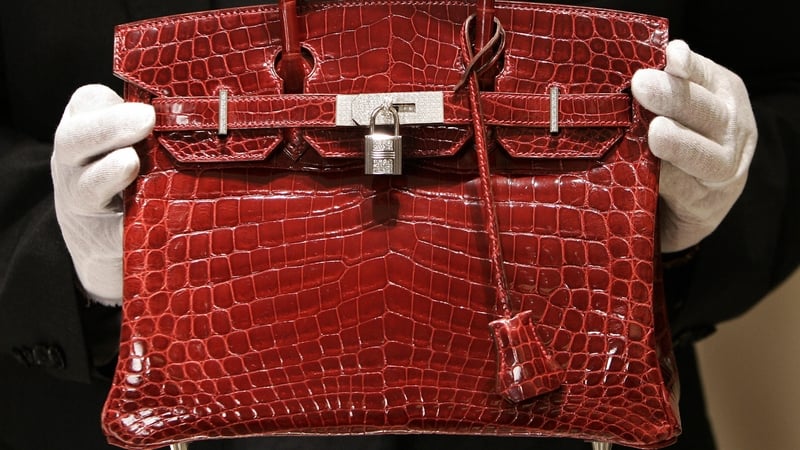 Hermes, known for its $10,000-plus hand-stitched Birkin and Kelly bags, said revenue rose 11%