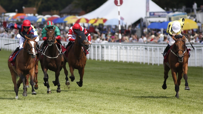 Big Orange (right) storms home to win the Goodwood Cup