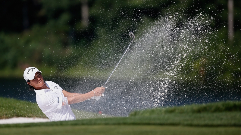 Ryo Ishikawa plays from a bunker on the 12th