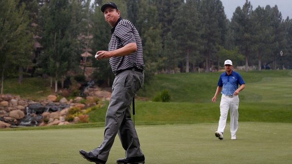 JJ Henry leads going in to the final round, while Jonas Blixt, also pictured,is one point behind the American