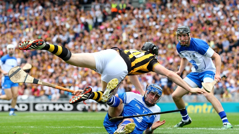 Waterford goalkeeper Stephen O'Keeffe tangles with Walter Walsh of Kilkenny