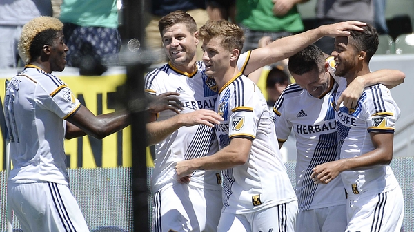Gerrard celebrates a goal with his new LA Galaxy team mates