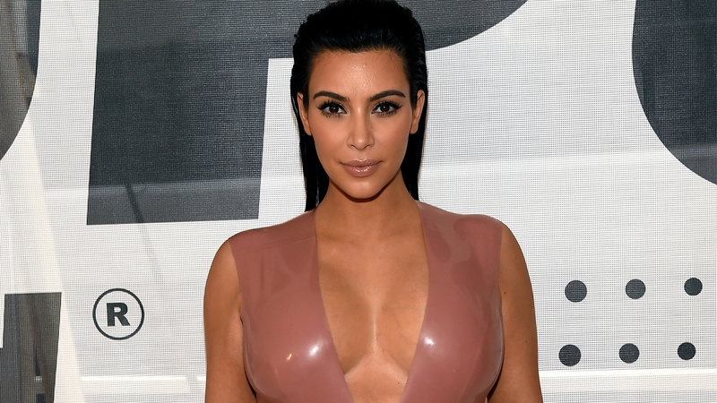 Kim Kardashian West blasts rumours she is using a surrogate for her second baby by posting naked selfie