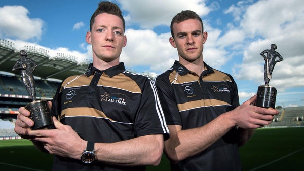 Monaghan's Conor McManus (L) and Galway's Jonathan Glynn with their awards