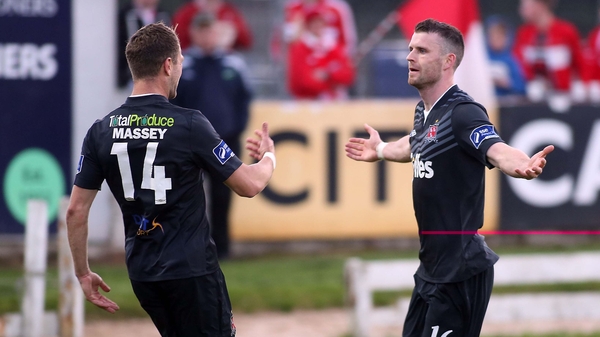 Dundalk's Ciaran Kilduff celebrates scoring with Dane Massey