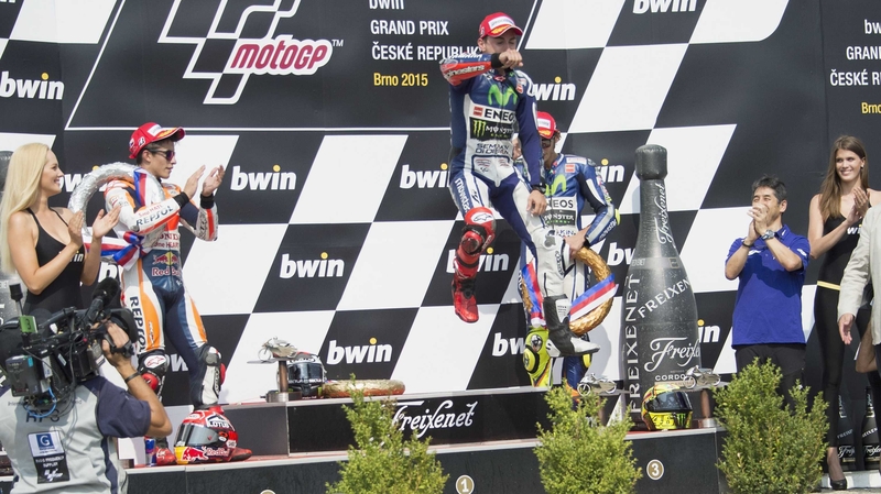 Jorge Lorenzo celebrates on the podium following his Czech victory