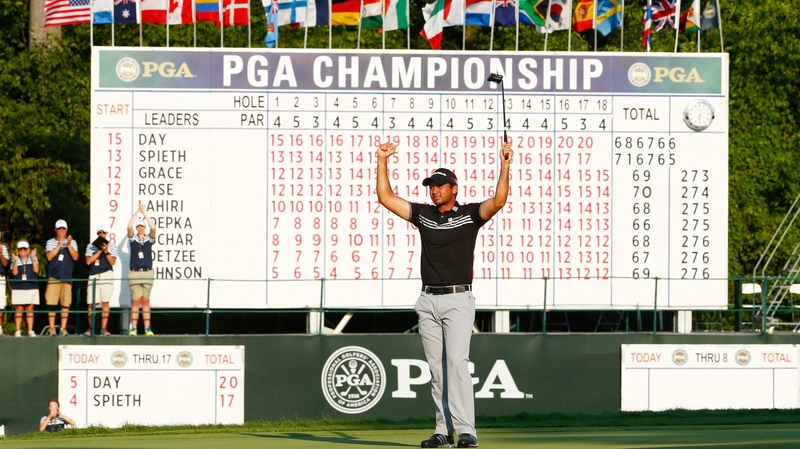 Jason Day celebrates on the 18th hole at Whistling Straits
