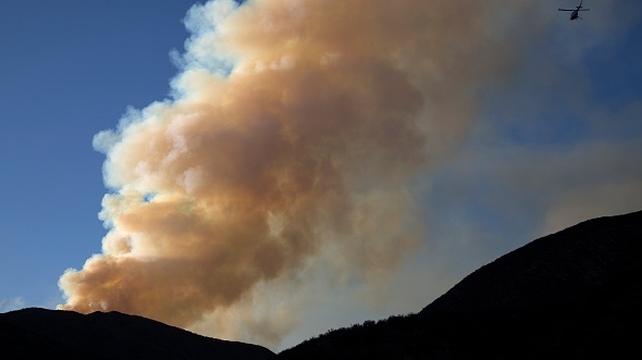 A smoke plume in the Angeles National Forest north of Castaic, California