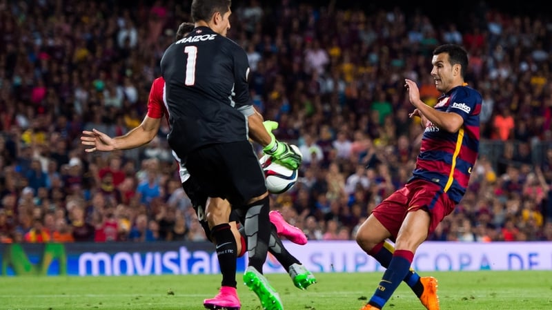 Pedro (R) in action for Barcelona this week
