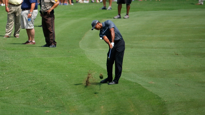Tiger Woods shares the lead at the Wyndham Championship