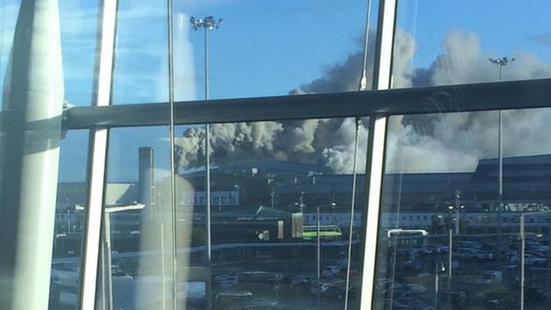 Smoke is seen from one of the terminal buildings at Dublin Airport (Pic: Pearse Cromwell)