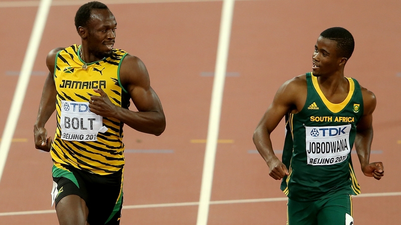 Usain Bolt had time for a chat as he crossed the line in his 200m semi-final