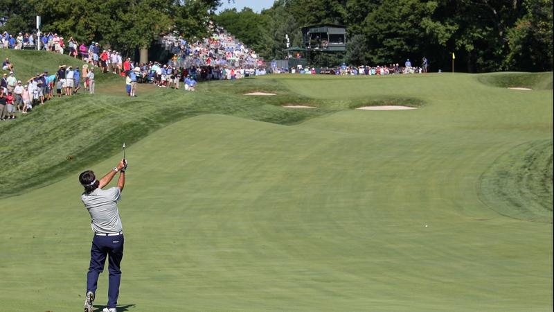 Bubba Watson plays his second shot on the 17th