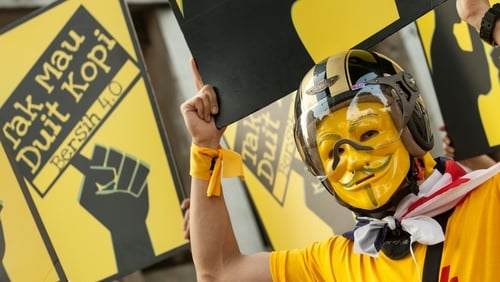 Rally triggered over financial crisis surrounding prime minister