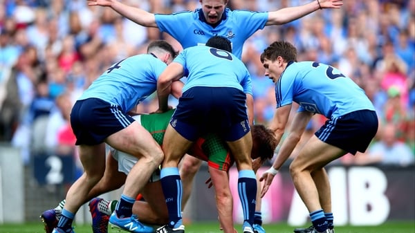 Aidan O'Shea of Mayo surrounded by Philly McMahon, Cian O'Sullivan, Jack McCaffrey and Michael Fitzsimons of Dublin