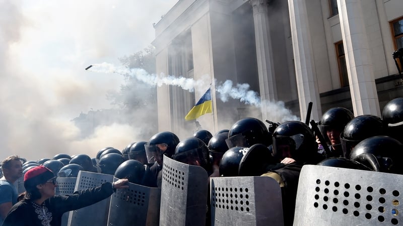 Protesters clash with police officers in front of parliament buldings in Kiev, Ukraine